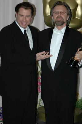 Photo: Picture of John Travolta and Jan A.P. Kaczmarek | 77th Annual Academy Awards 77-1081.jpg