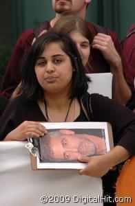 A fan holds a photo of George Clooney at the 2009 Toronto International Film Festival premiere of Men Who Stare at Goats. ©2009 DigitalHit.com. Photographer:Ian Evans All rights reserved.