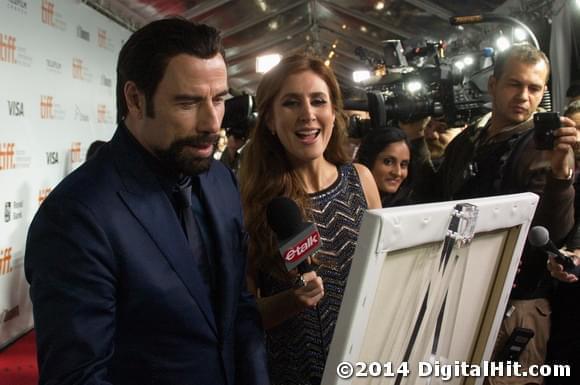 John Travolta and Jessi Cruickshank at The Forger premiere | 39th Toronto International Film Festival