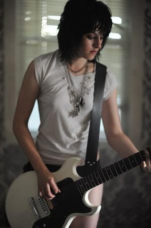 Kristen Stewart as Joan Jett in The Runaways