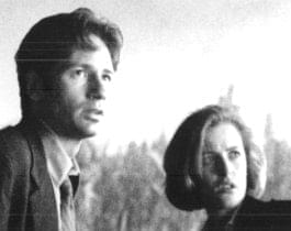 Mulder and Scully investigate a cornfield. Copyright 1998 Twentieth Century Fox